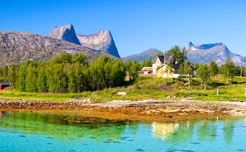 Efjorden Norway mountains, house and bright green blue water