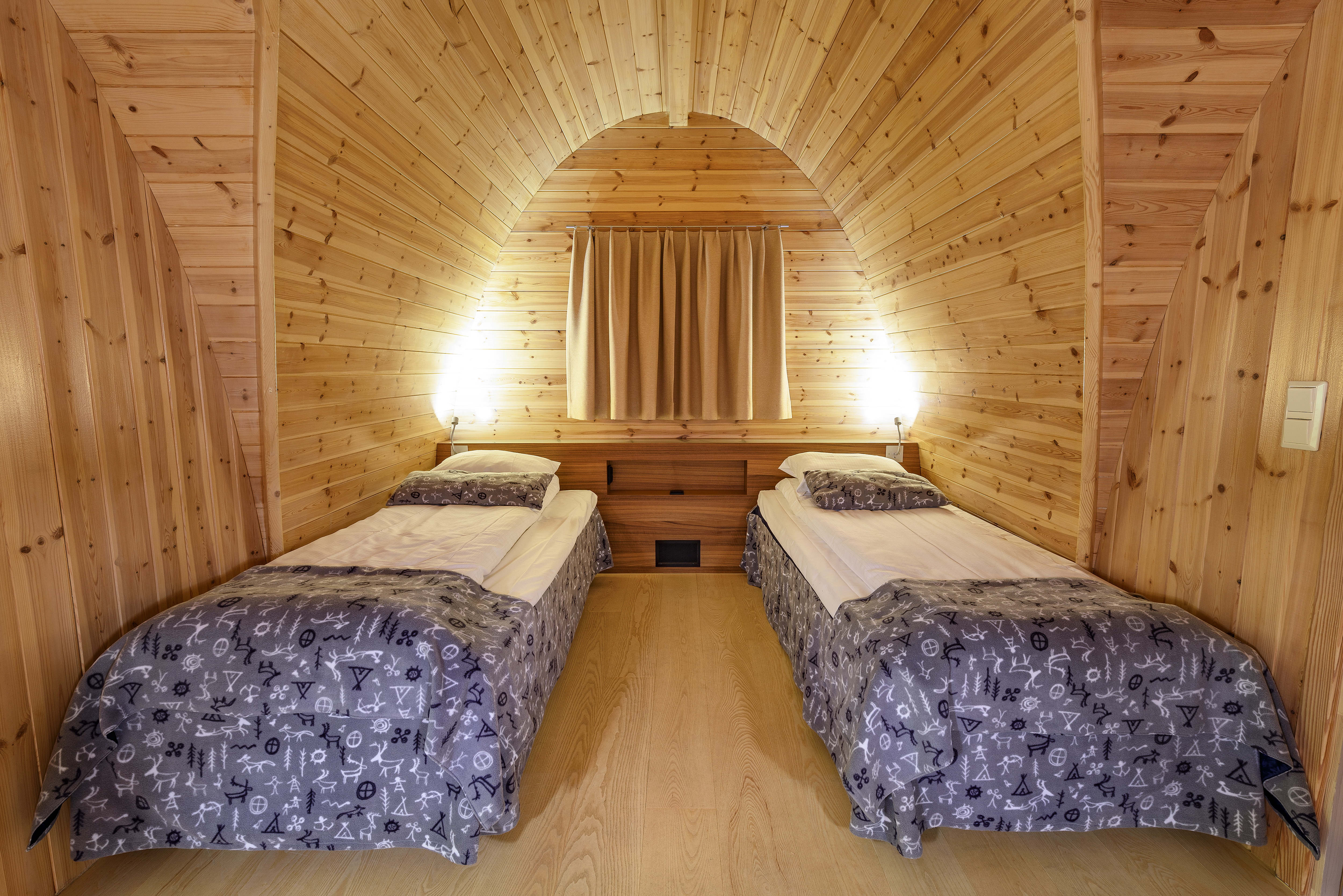 Snowhotel Kirkenes twin beds in wooden cabin