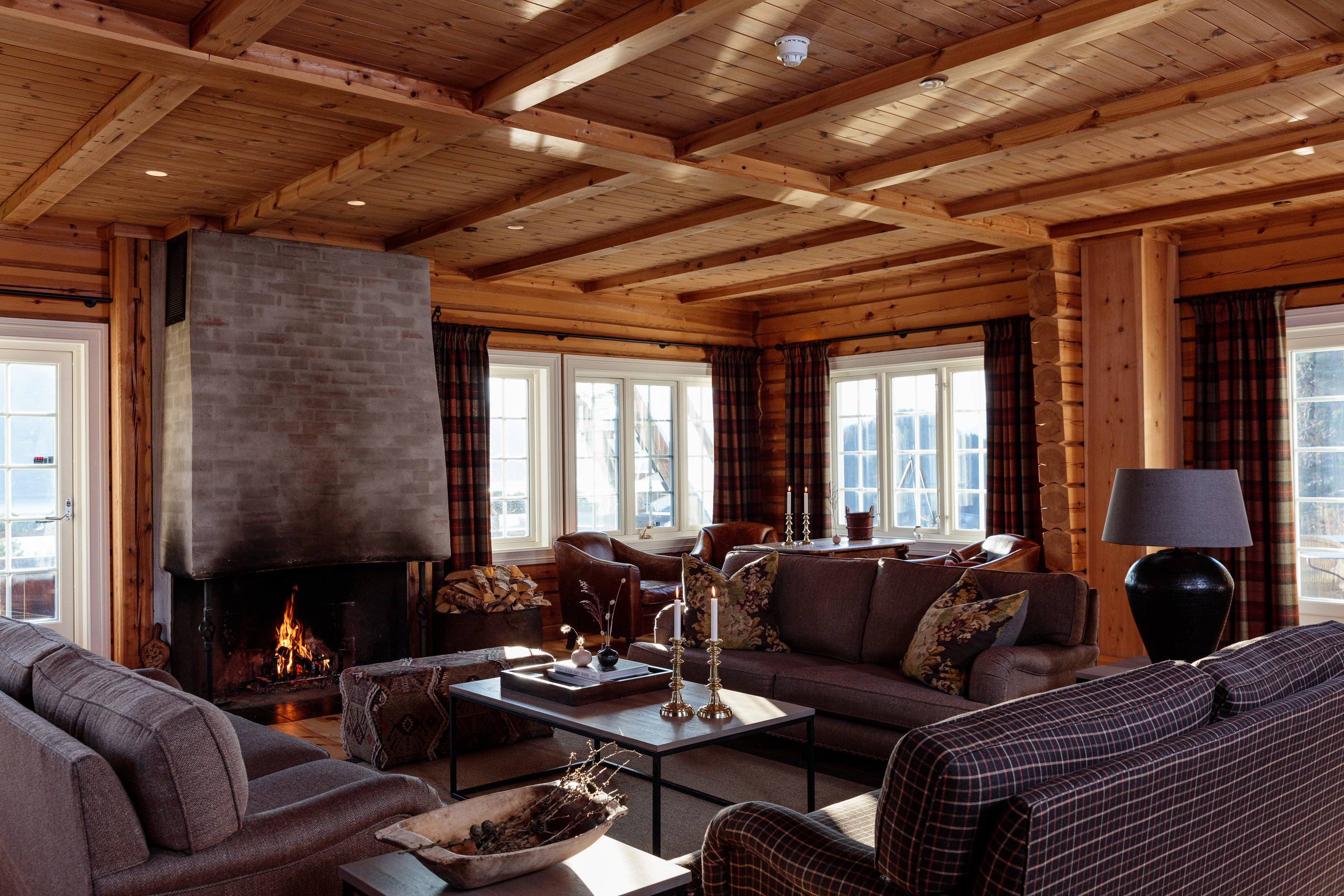 Storfjord Hotel living room with open fire place