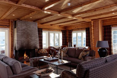 Storfjord Hotel living room with open fire place