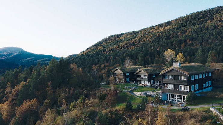 Storfjord Hotel wooden chalet buildings in trees