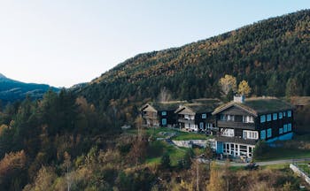 Storfjord Hotel wooden chalet buildings in trees