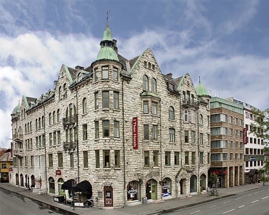 Thon Hotel Nidaros neo-gothic stone exterior of hotel with green roofed turrets