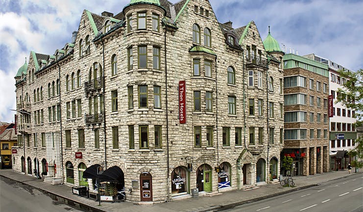 Thon Hotel Nidaros neo-gothic stone exterior of hotel with green roofed turrets