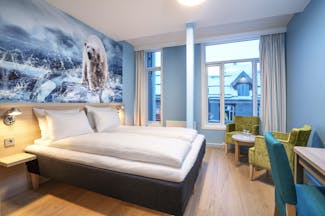 Thon Hotel Polar bedroom with polar scene on the walls