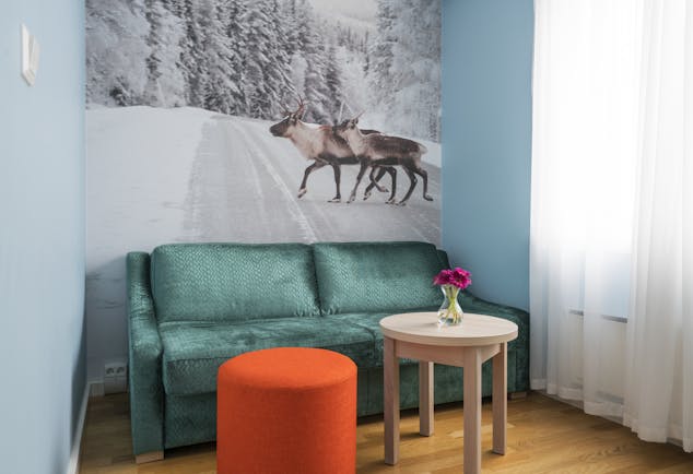 Thon Hotel Polar room with reindeer and snow as wall painting