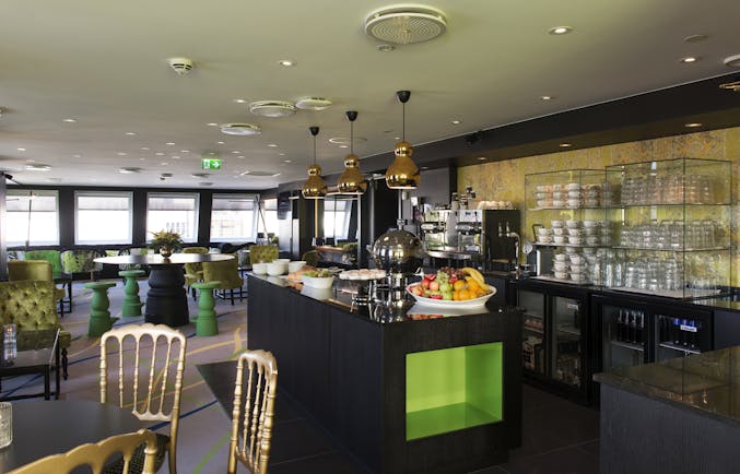 Central food area with glasses and tables Thon Hotel Rosenkrantz Oslo
