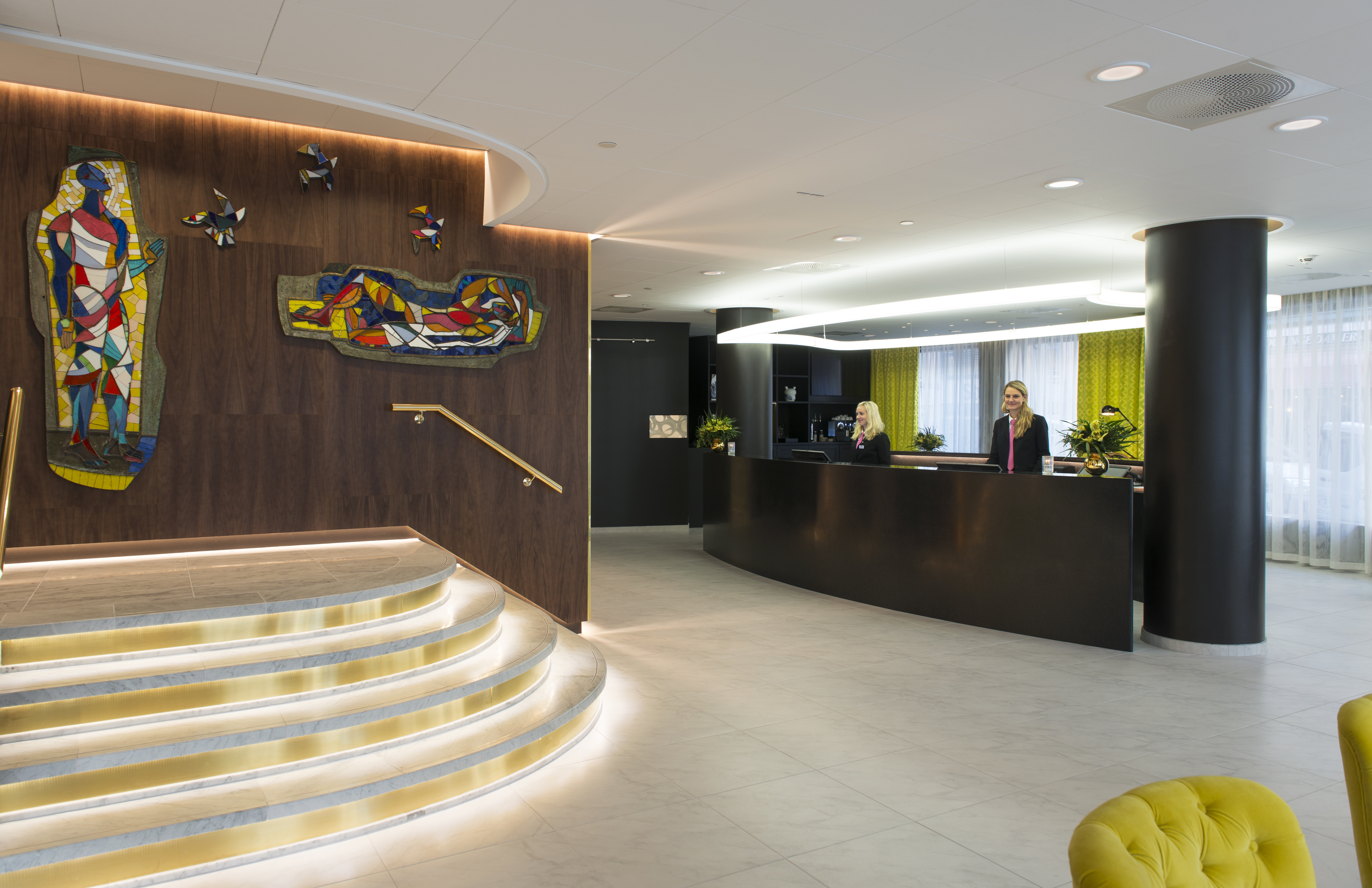 Wooden reception desk and stairs at Thon Hotel Rosenkrantz Oslo