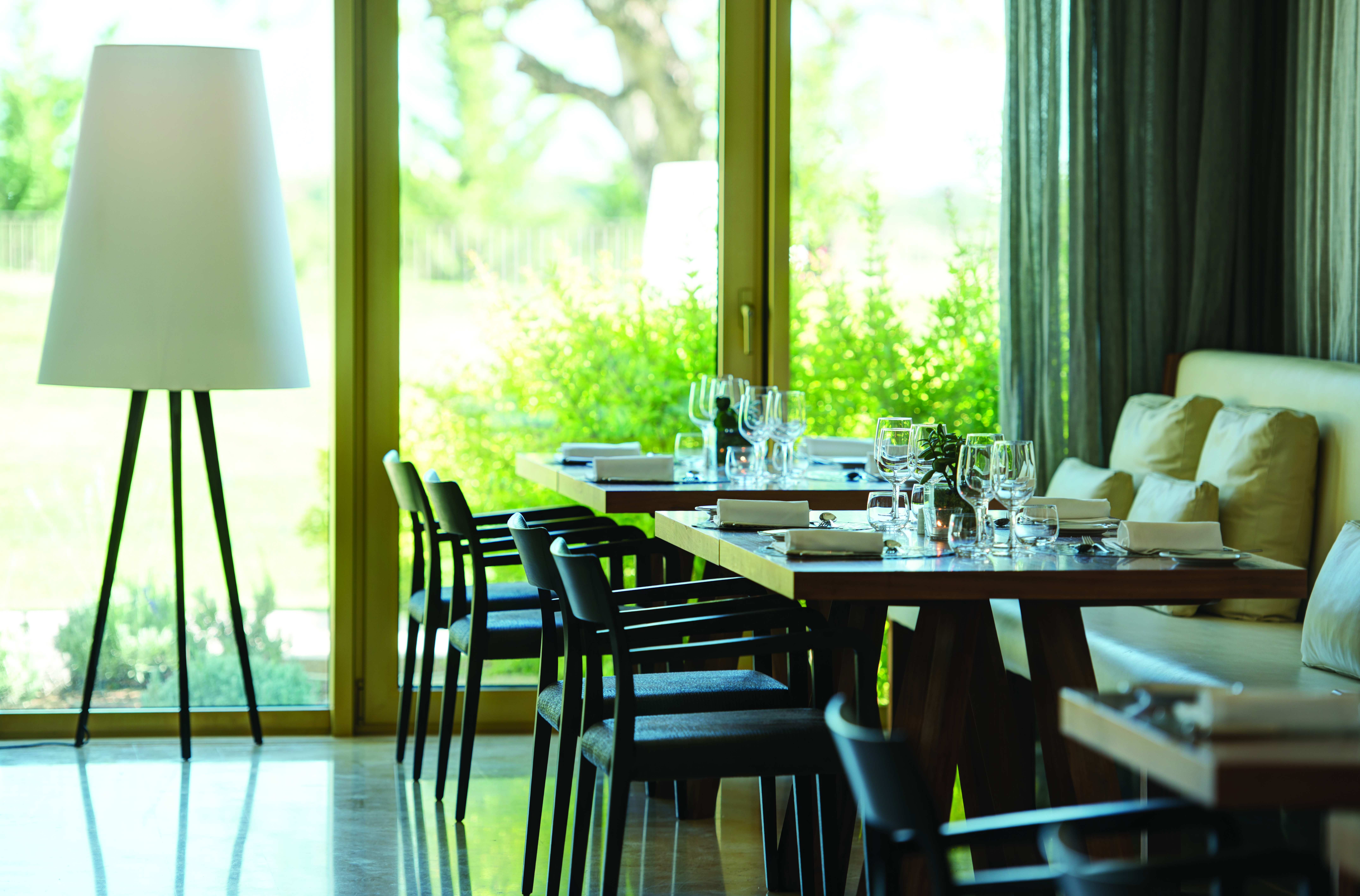 Anantara Vilamoura Portugal restaurant indoor dining area with large patio doors