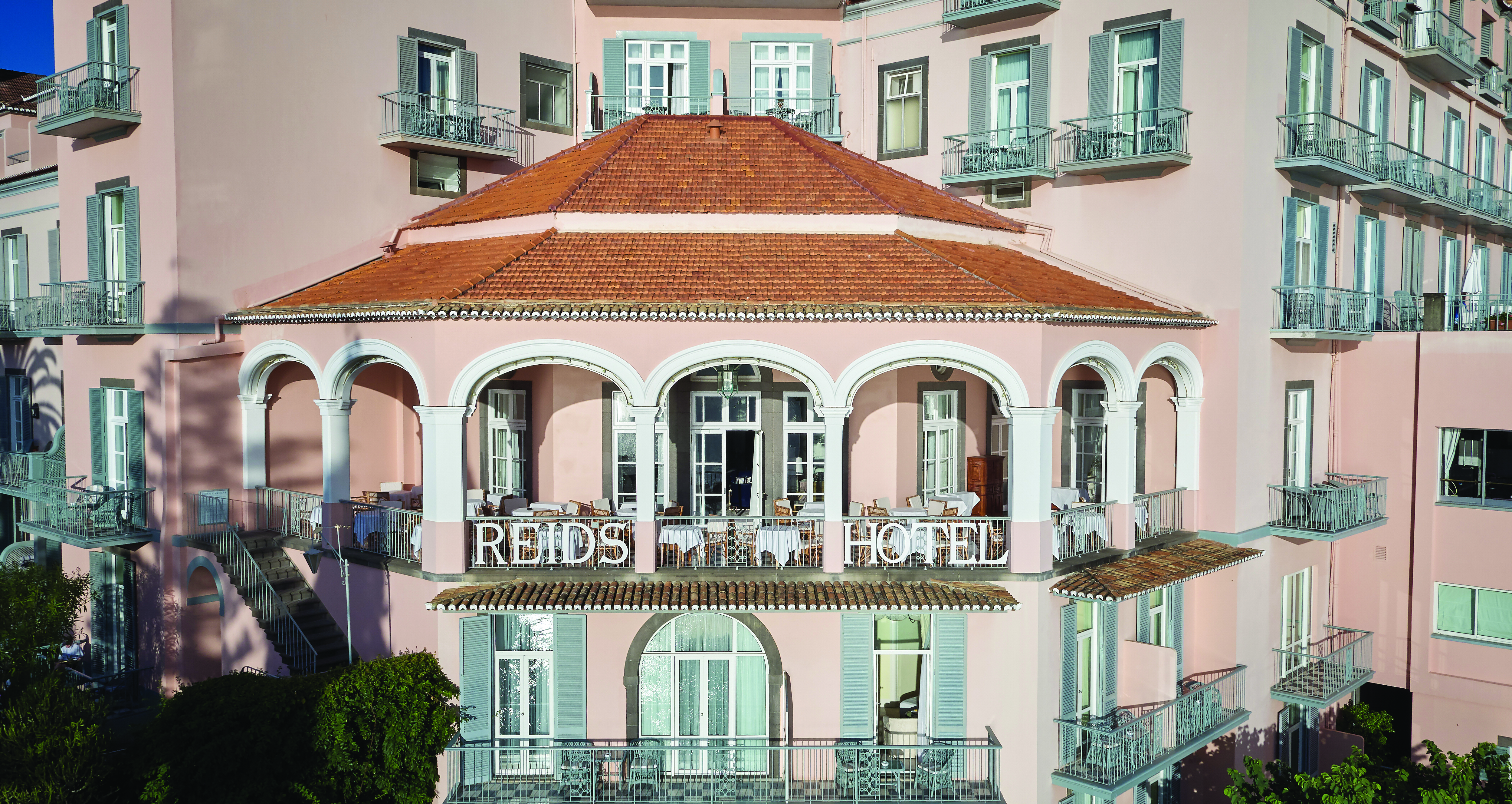 Palatial hotel on cliff overlooking sea
