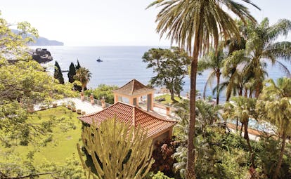 Palatial hotel on cliff overlooking sea