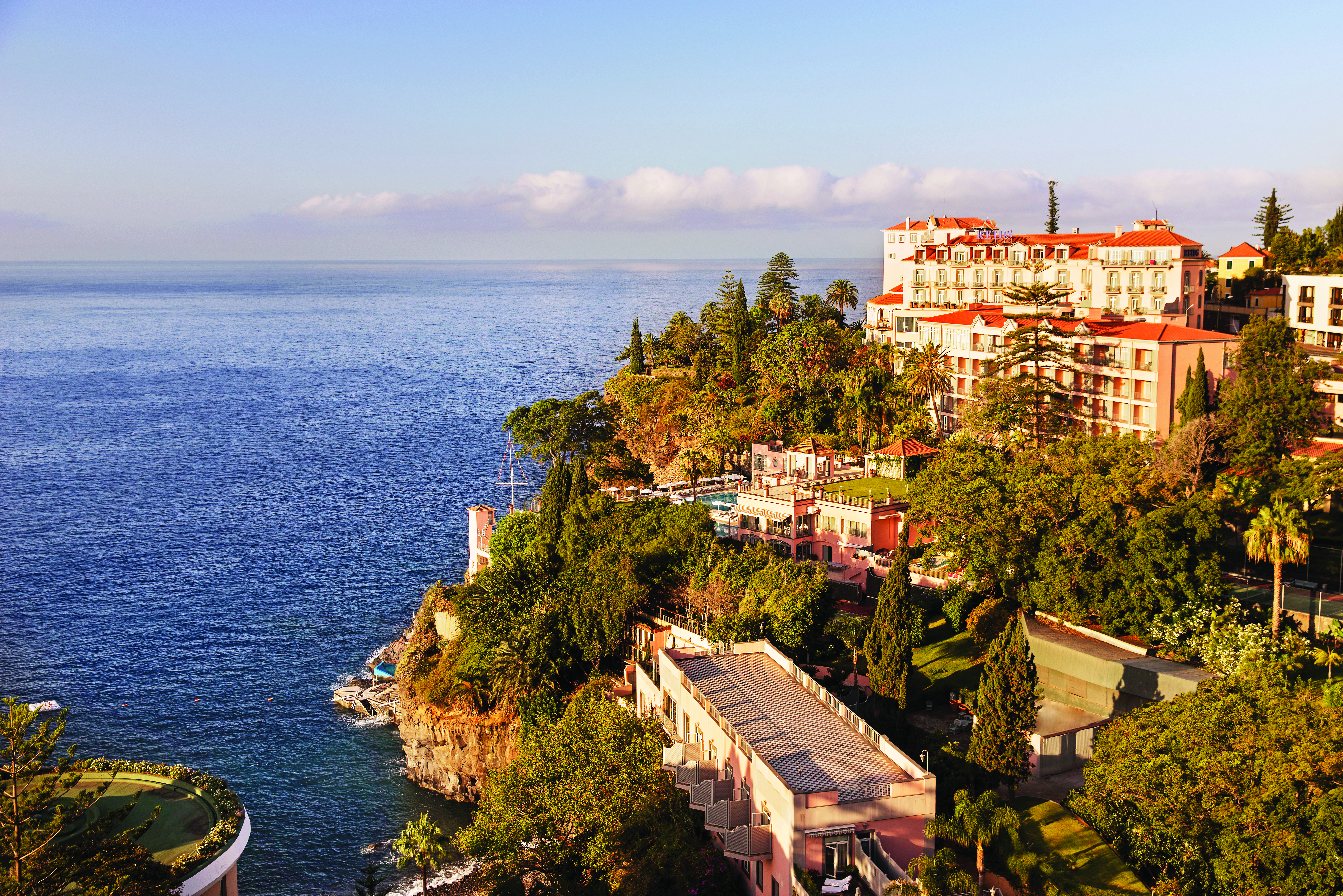 Palatial hotel on cliff overlooking sea