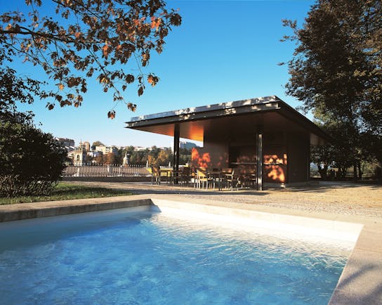 Casa da Calcada Portugal outdoor pool next to covered outdoor terrace area