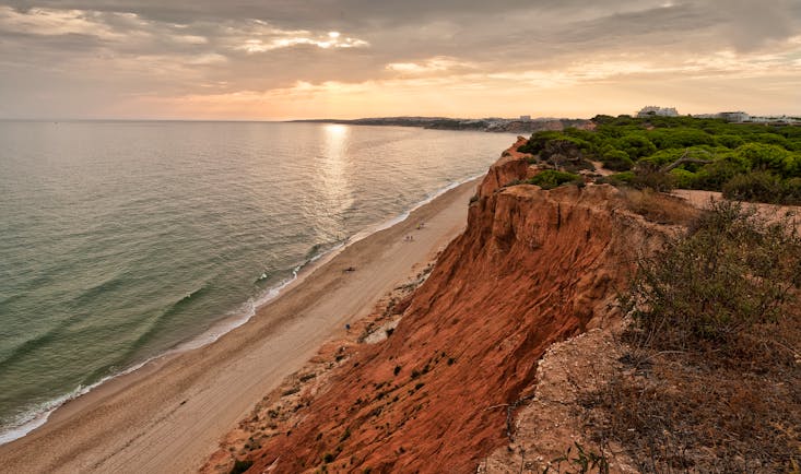 Epic Sana beach, cliffside, sandy beach with blue ocean water