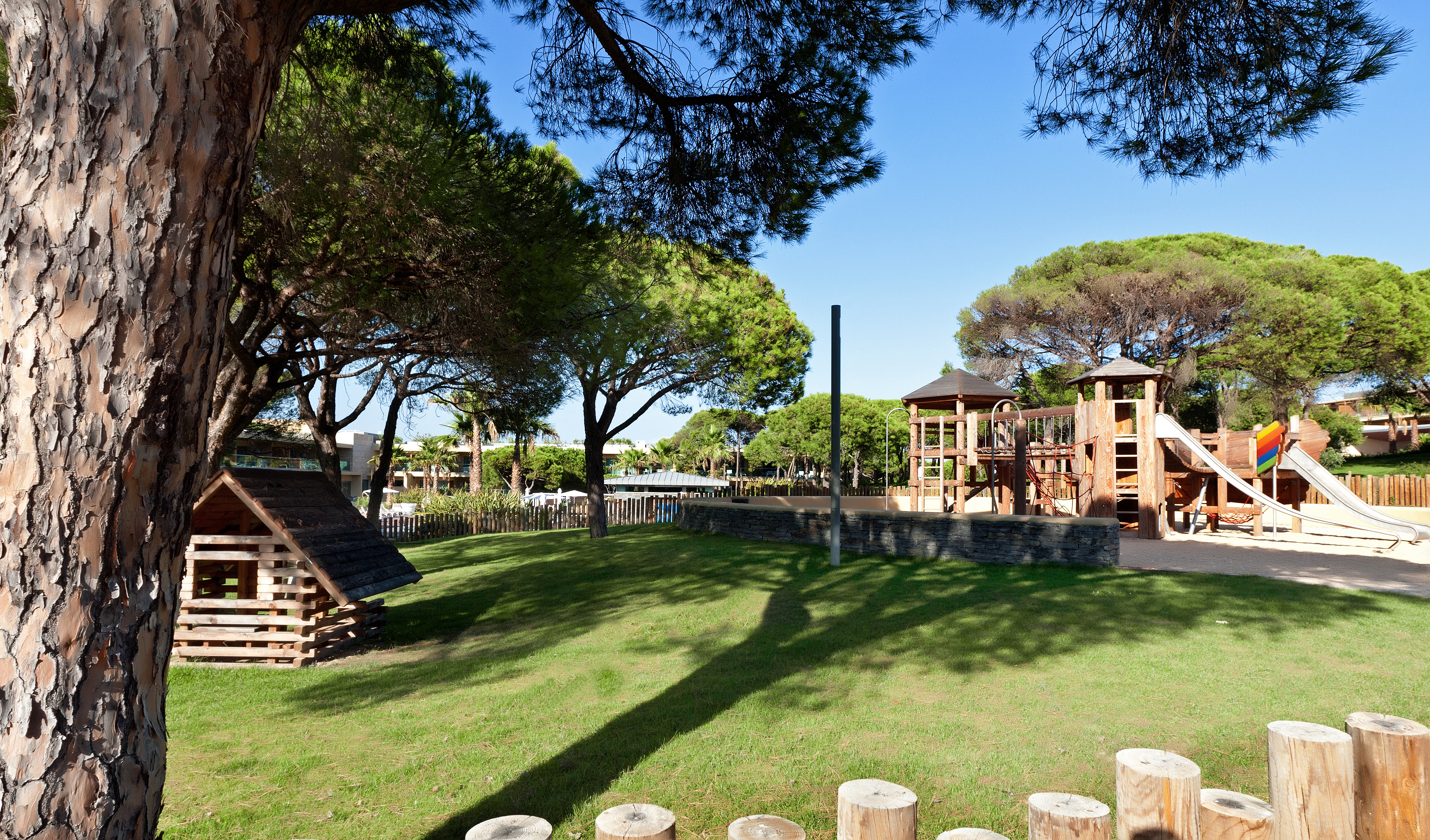 Epic Sana outdoor playground for children with climbing frames and slides