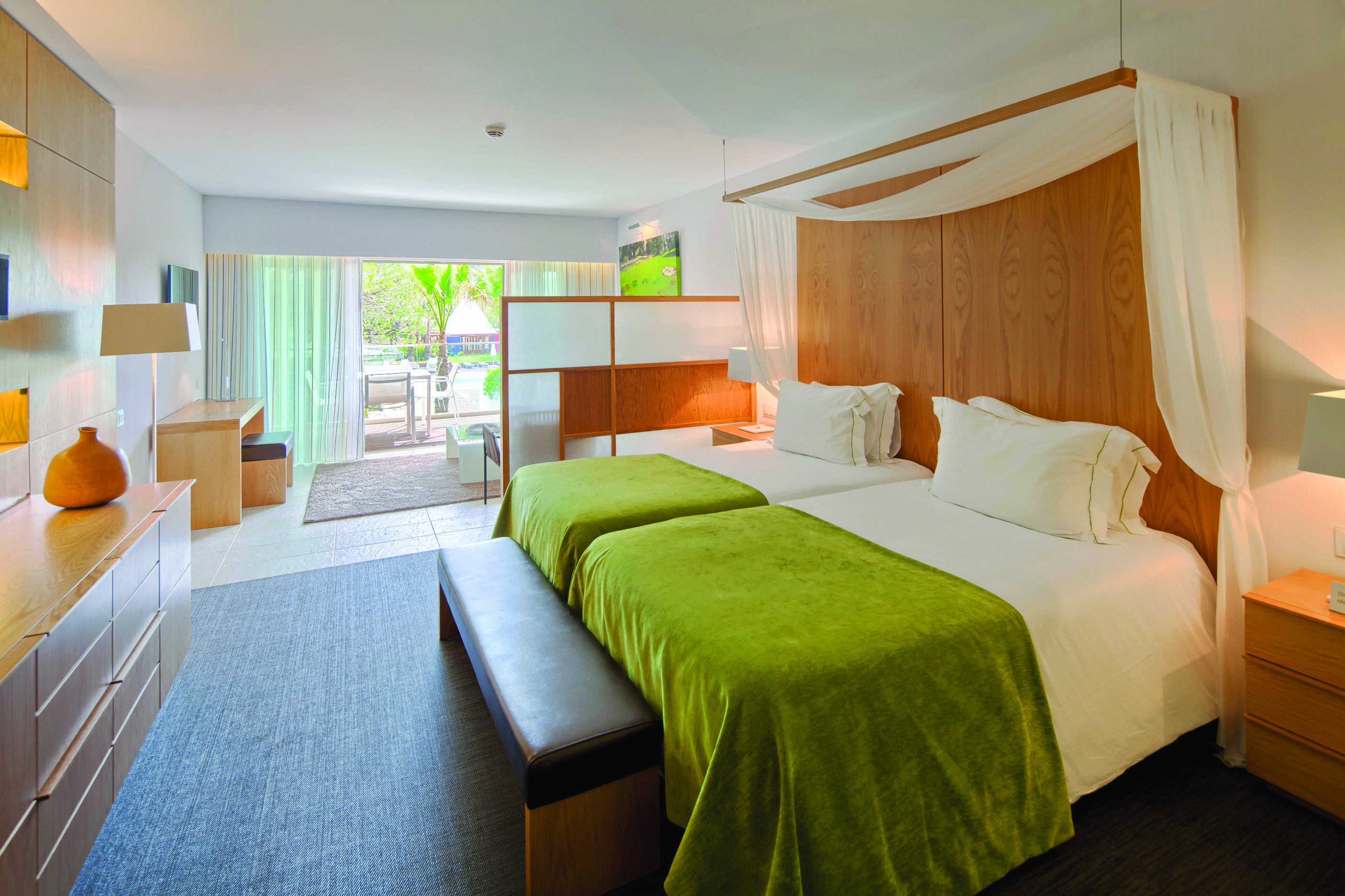 Epic Sana so suite, twin beds lounge area, balcony, colourful decor