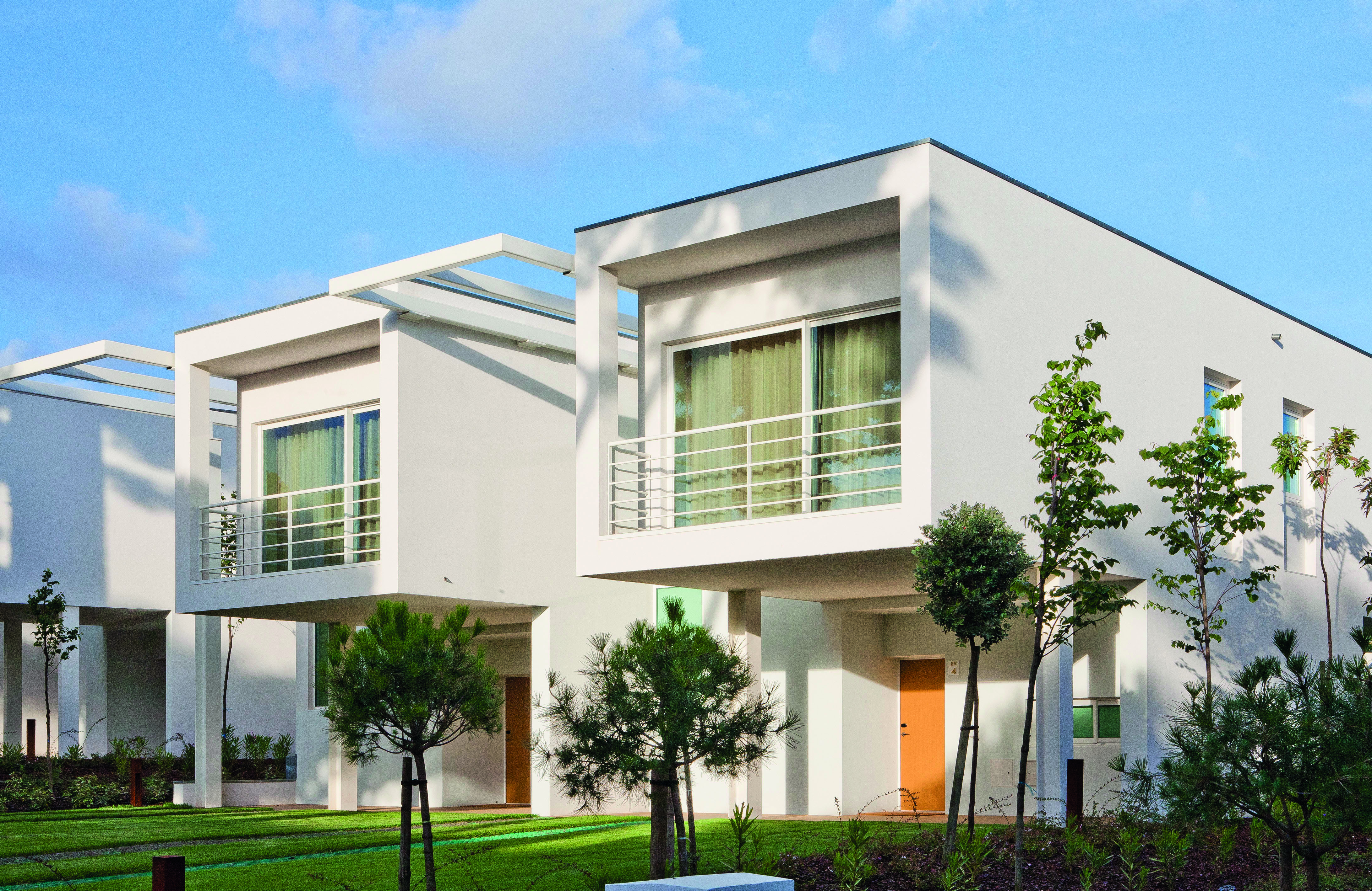 Martinhal Cascais Portugal luxury villa exterior large white buildings white balconies