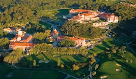 Penha Longa Portugal aerial view of golf course surrounded by trees and complex of buildings