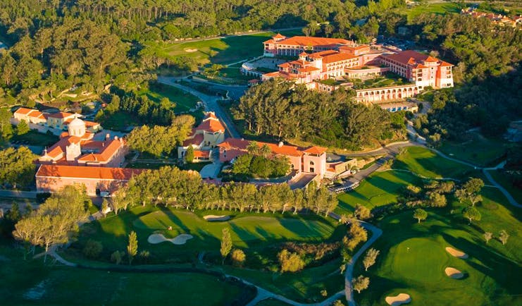 Penha Longa Portugal aerial view of golf course surrounded by trees and complex of buildings