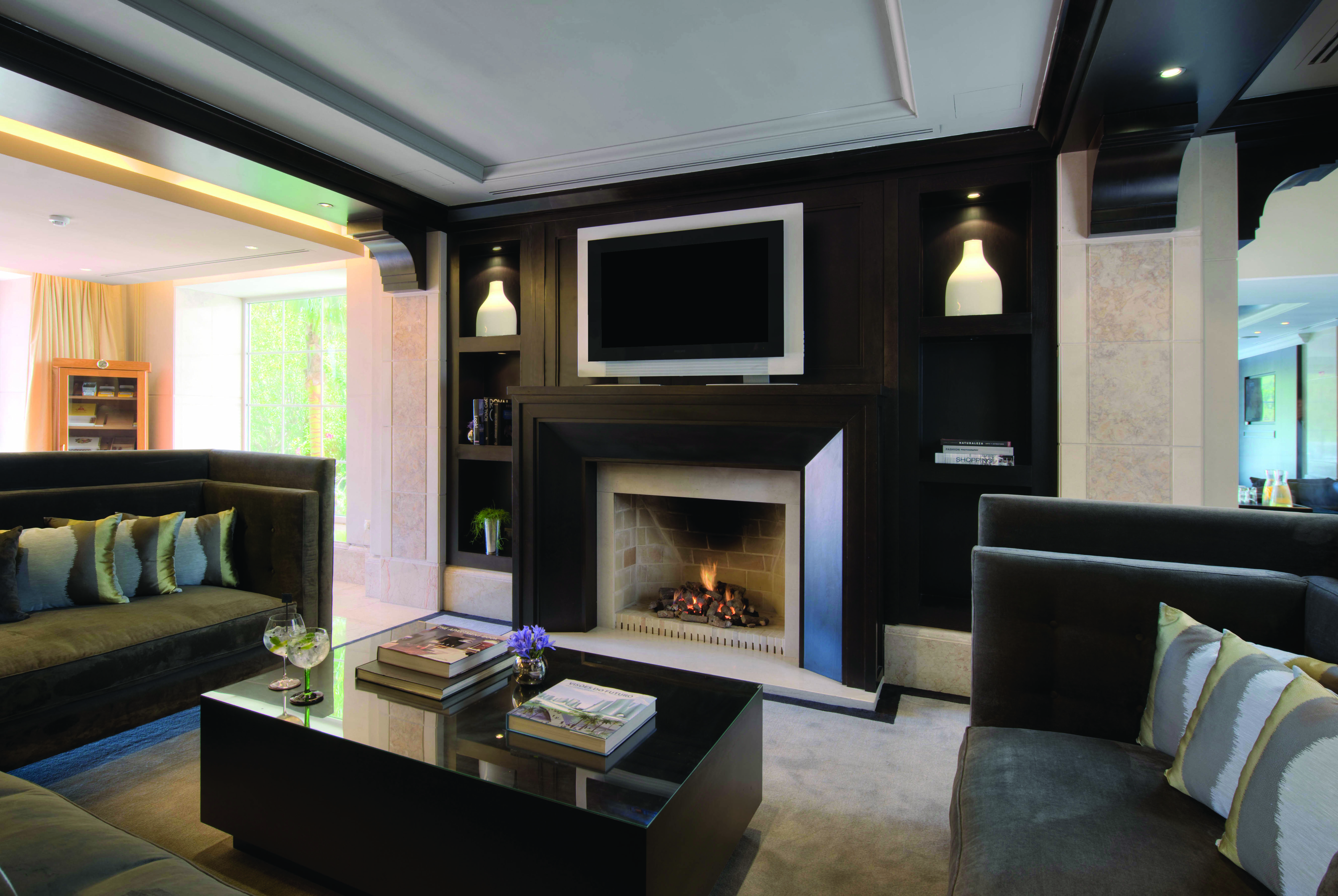 Lobby with television, sofas and coffee table