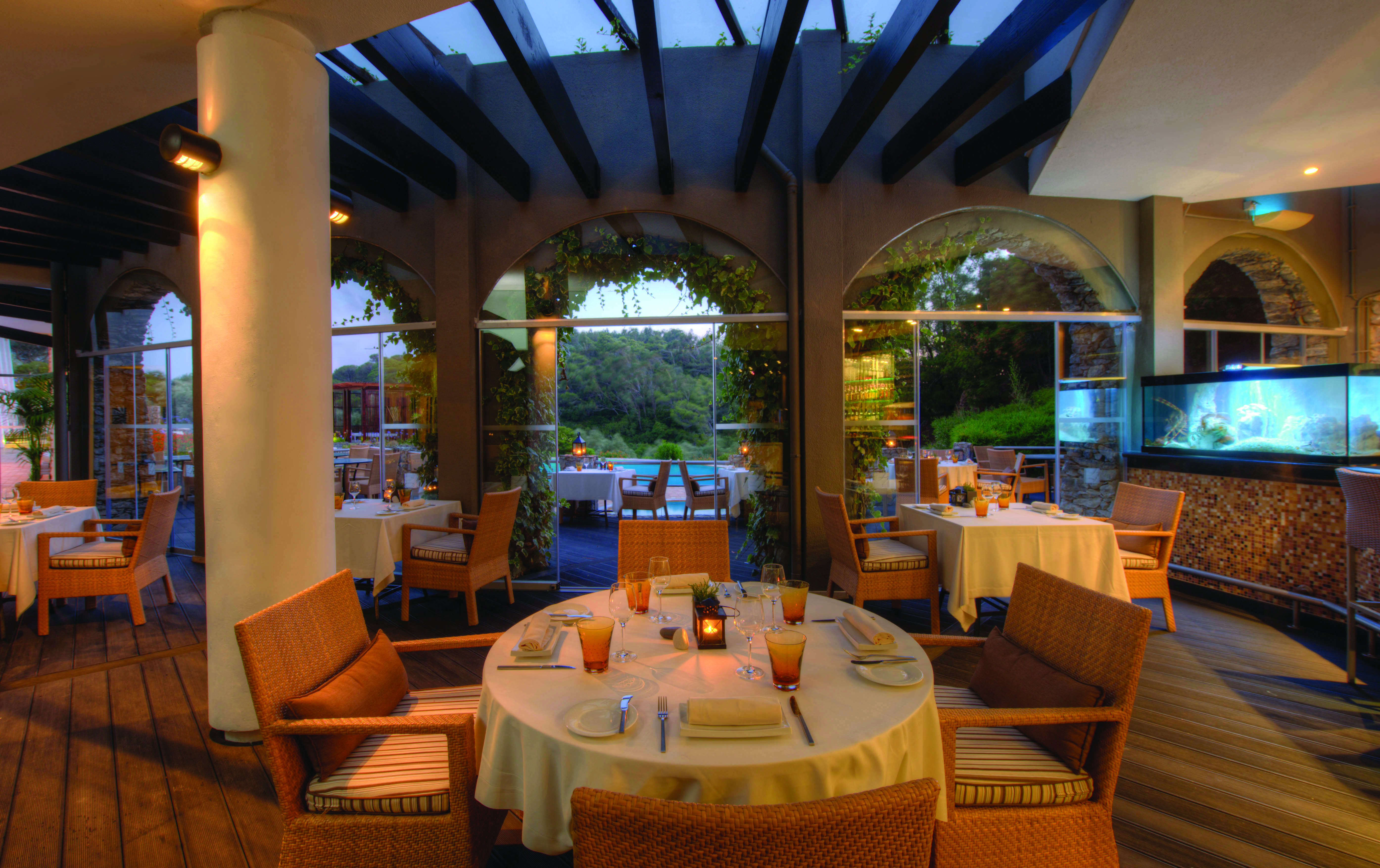 Restaurant Aqua with tables and chairs set up for dining