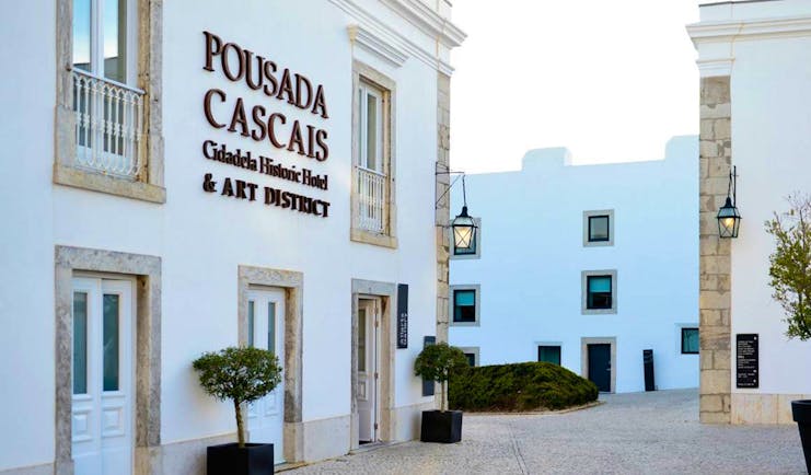 Pestana Cidadela Cascais entrance, hotel buildings, shrubs in potd