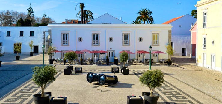 Pestana Cidadela Cascais exterior. terrace courtyard, outdoor seating area. shrubbery