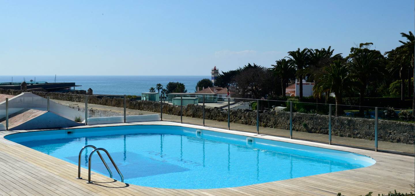 Pestana Cidadela Cascais outdoor pool, terrace, sea in background