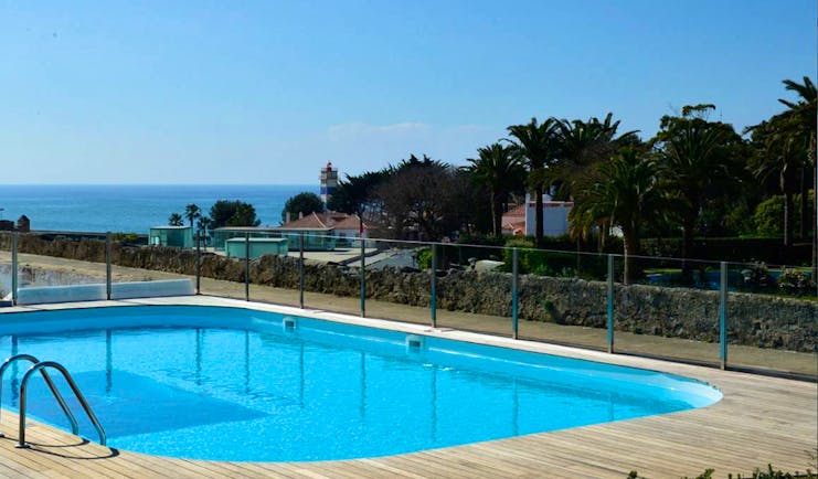 Pestana Cidadela Cascais outdoor pool, terrace, sea in background