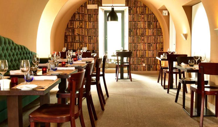 Pestana Cidadela Cascais restaurant, tables and chairs, curved ceiling, traditional taverna decor