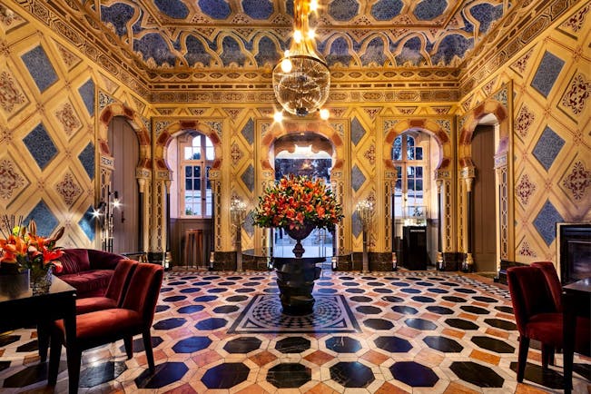 Pestana Palacio do Freixo entrance hall, intricate colourful tiling on walls and floors