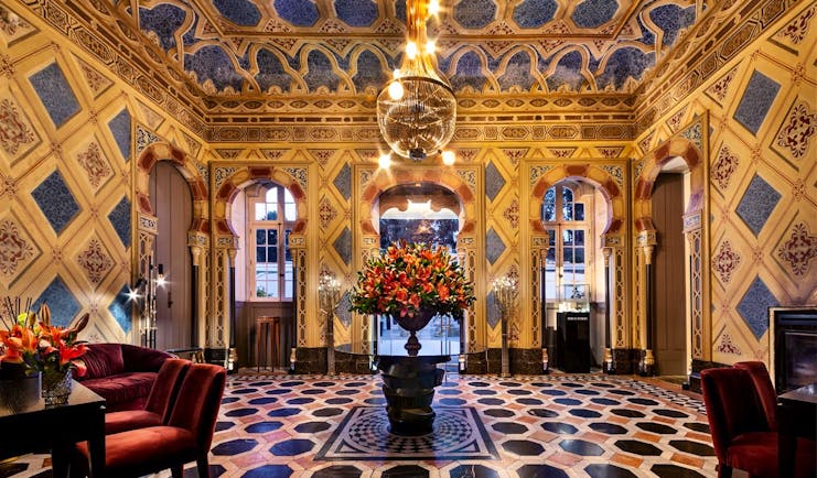Pestana Palacio do Freixo entrance hall, intricate colourful tiling on walls and floors