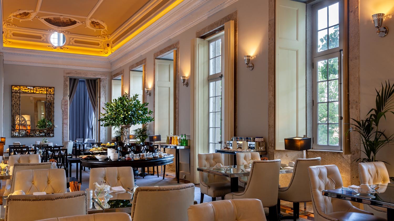 Pestana Palacio do Freixo restaurant, tables and chairs, high ceilings, sash windows