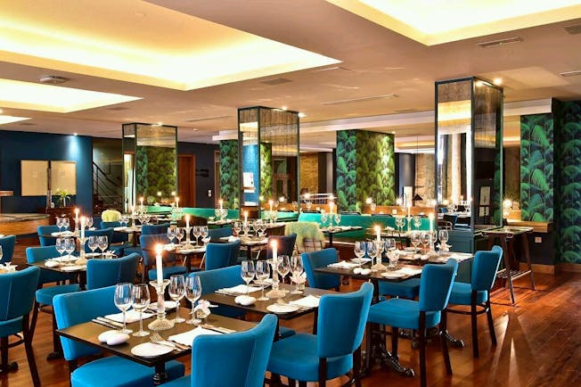 Pestana Vintage Porto restaurant, tables and chairs, wooden floors, blue details