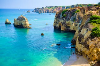 Lagos shoreline in the Algarve, cliffs, rock formations, bright blue sea