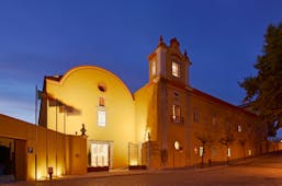 Pousada Convento de Tavira exterior at night, historic hotel building
