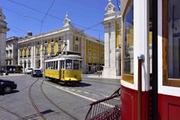Pousada de Lisboa exterior, yellow hotel builing, yellow tram, streets of Lisbon