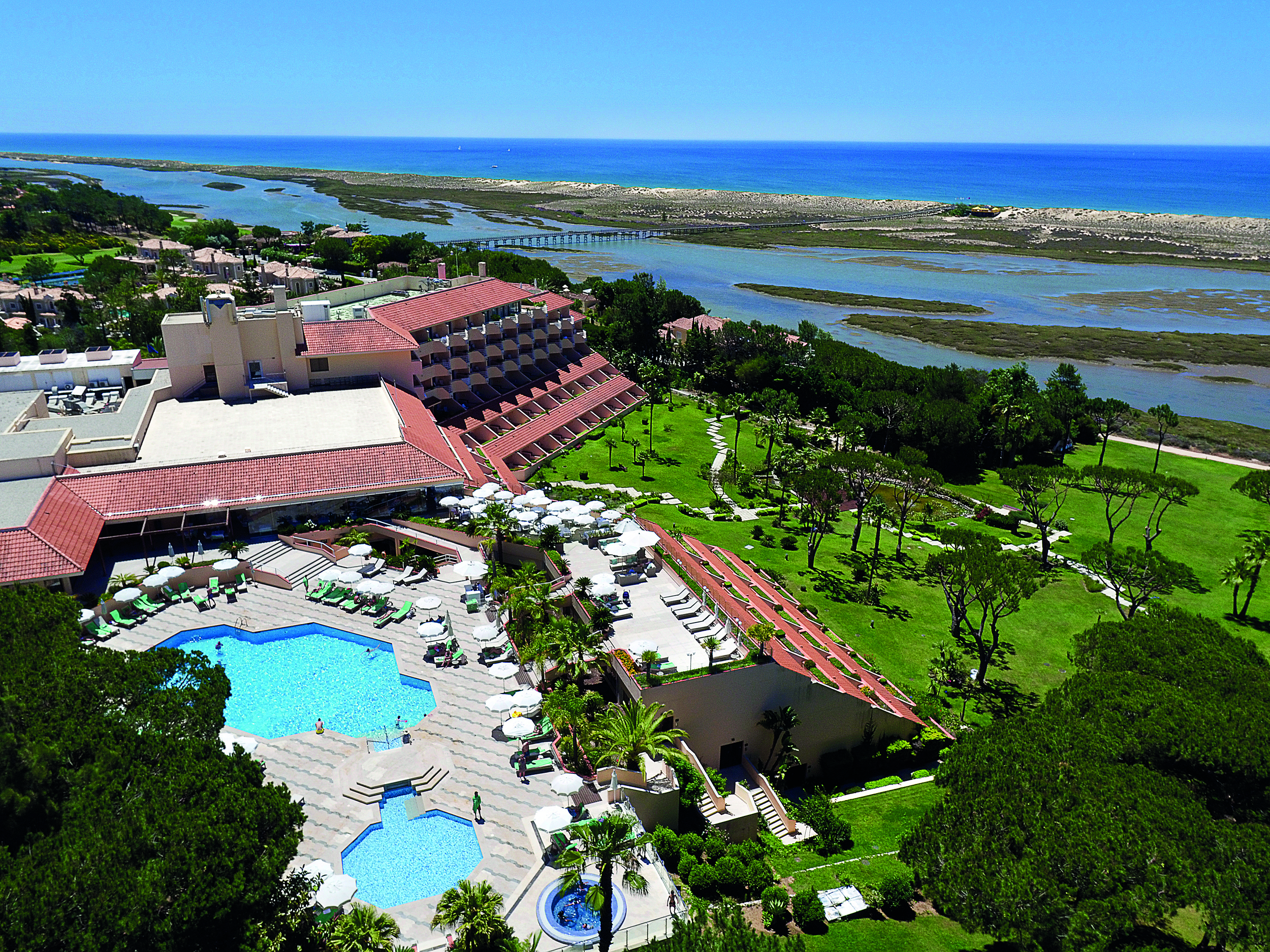 Quinta do Lago Portugal aerial exterior view of a large hotel building with outdoor pools 