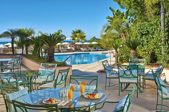 Quinta do Lago Portugal outdoor pool bar and terraced dining area 