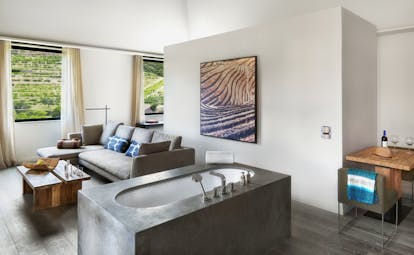 Six Senses Douro Valley Portugal courtyard suite lounge with free standing stone bath