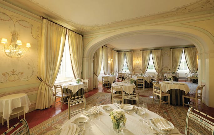 Tivoli Palacio de Seteais Portugal restaurant daytime dining area with archway and draped curtains