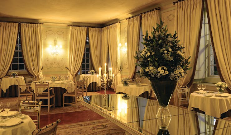 Tivoli Palacio de Seteais Portugal restaurant night large dining area with archway with draped curtains