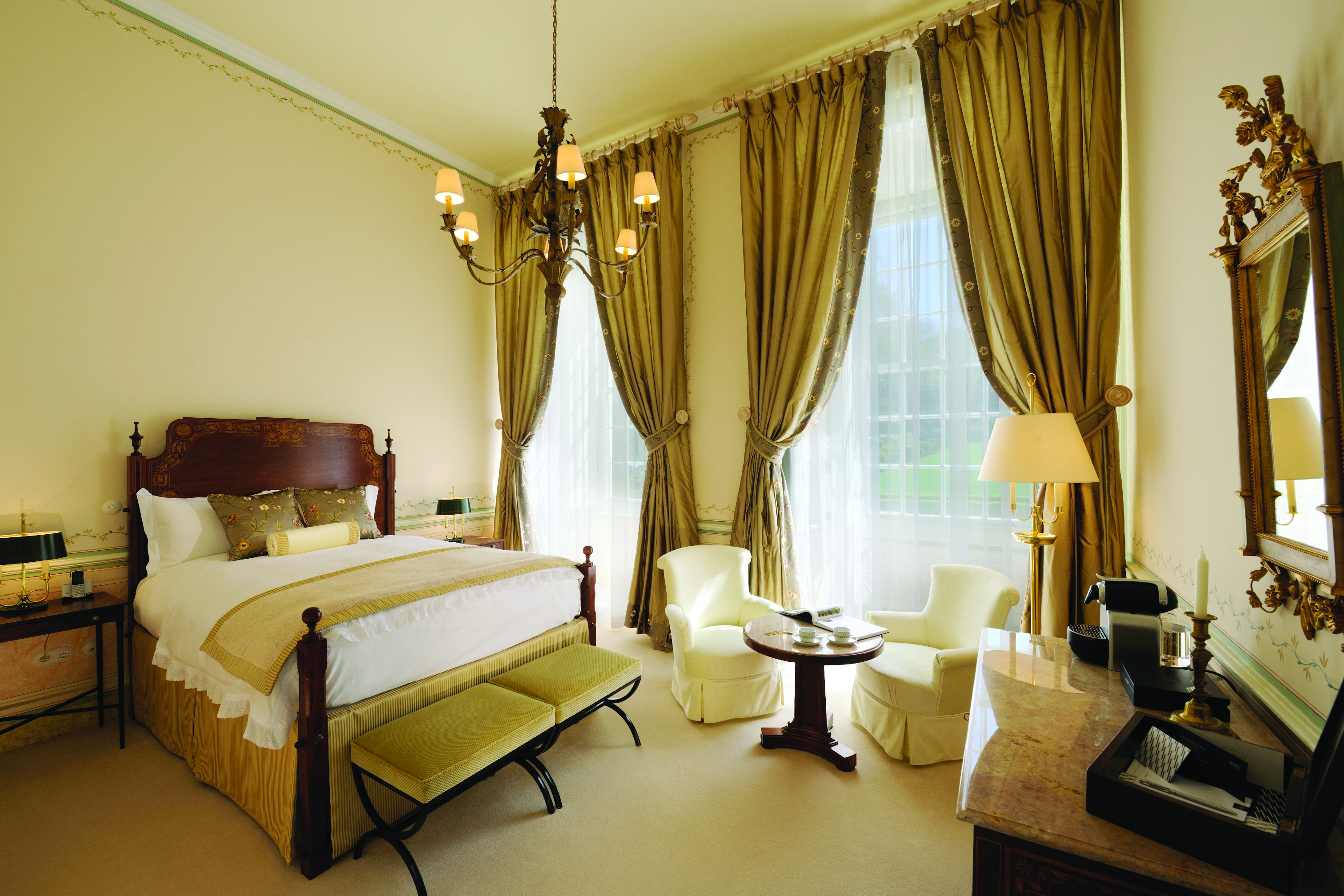 Tivoli Palacio de Seteais Portugal superior double bedroom with large windows and draped curtains and chairs and desk