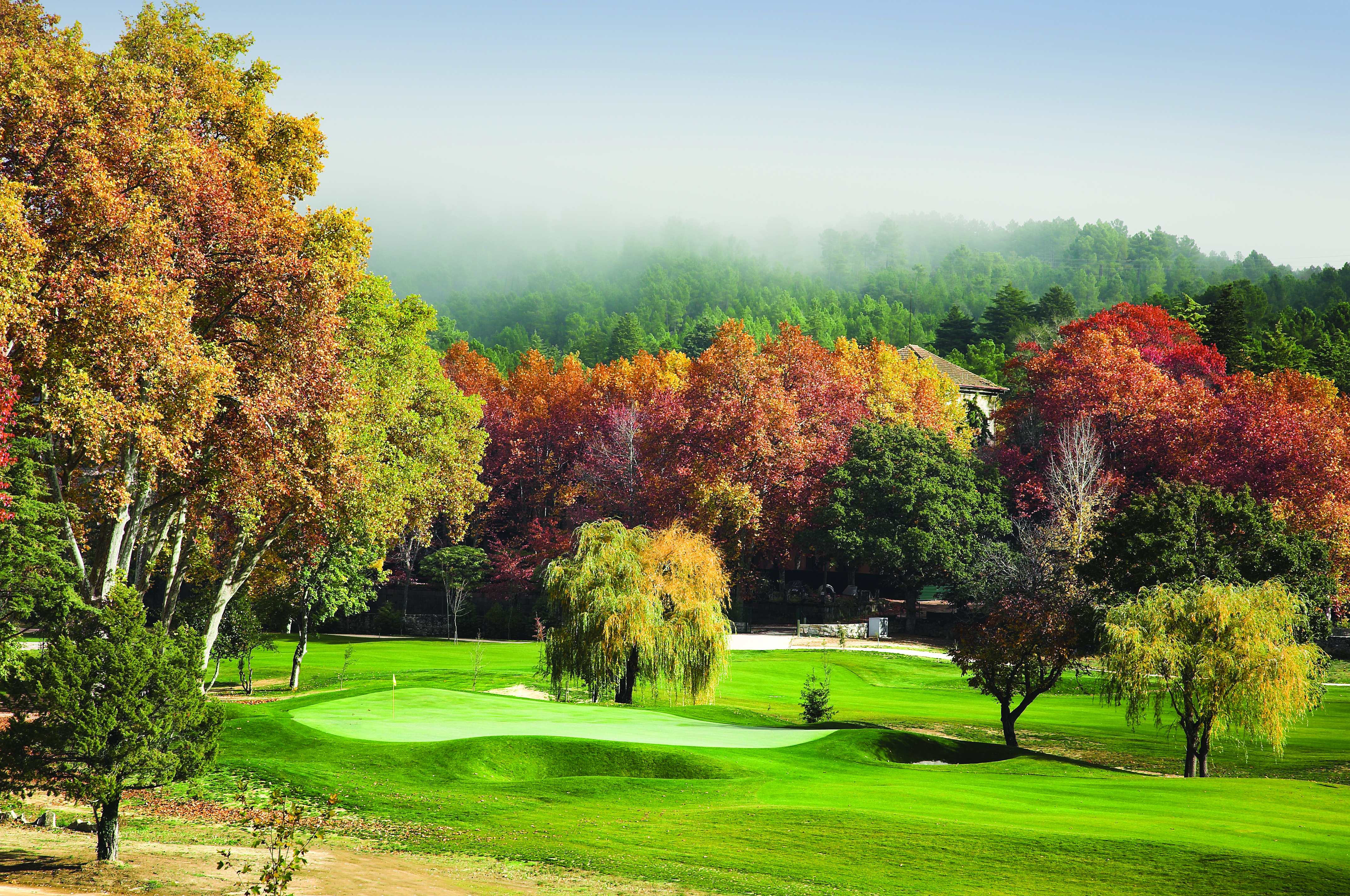 Vidago Palace Portugal golf course with autumnal trees