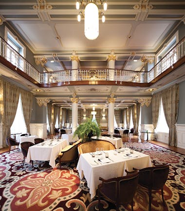 Vidago Palace Portugal grand ballroom dining room with balcony with ornate decor