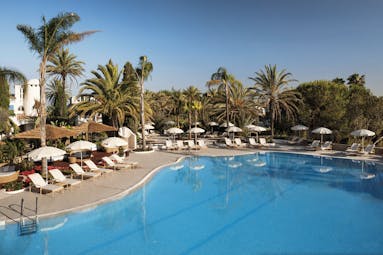 Vila Vita Parc Portugal outdoor pool with sun loungers and umbrellas