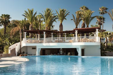 Vila Vita Parc Portugal pool bar outdoor swimming pool with swim up bar and elevated terrace