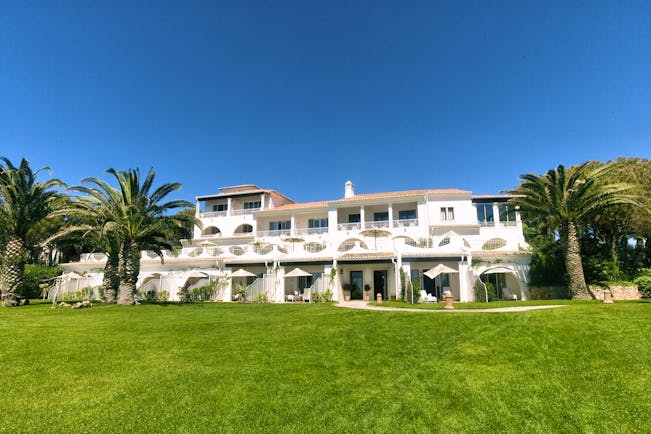 Vila Vita Parc Portugal residence gardens exterior view of white building with archways and palm trees