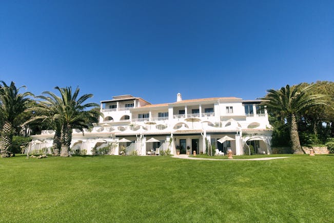 Vila Vita Parc Portugal residence gardens exterior view of white building with archways and palm trees