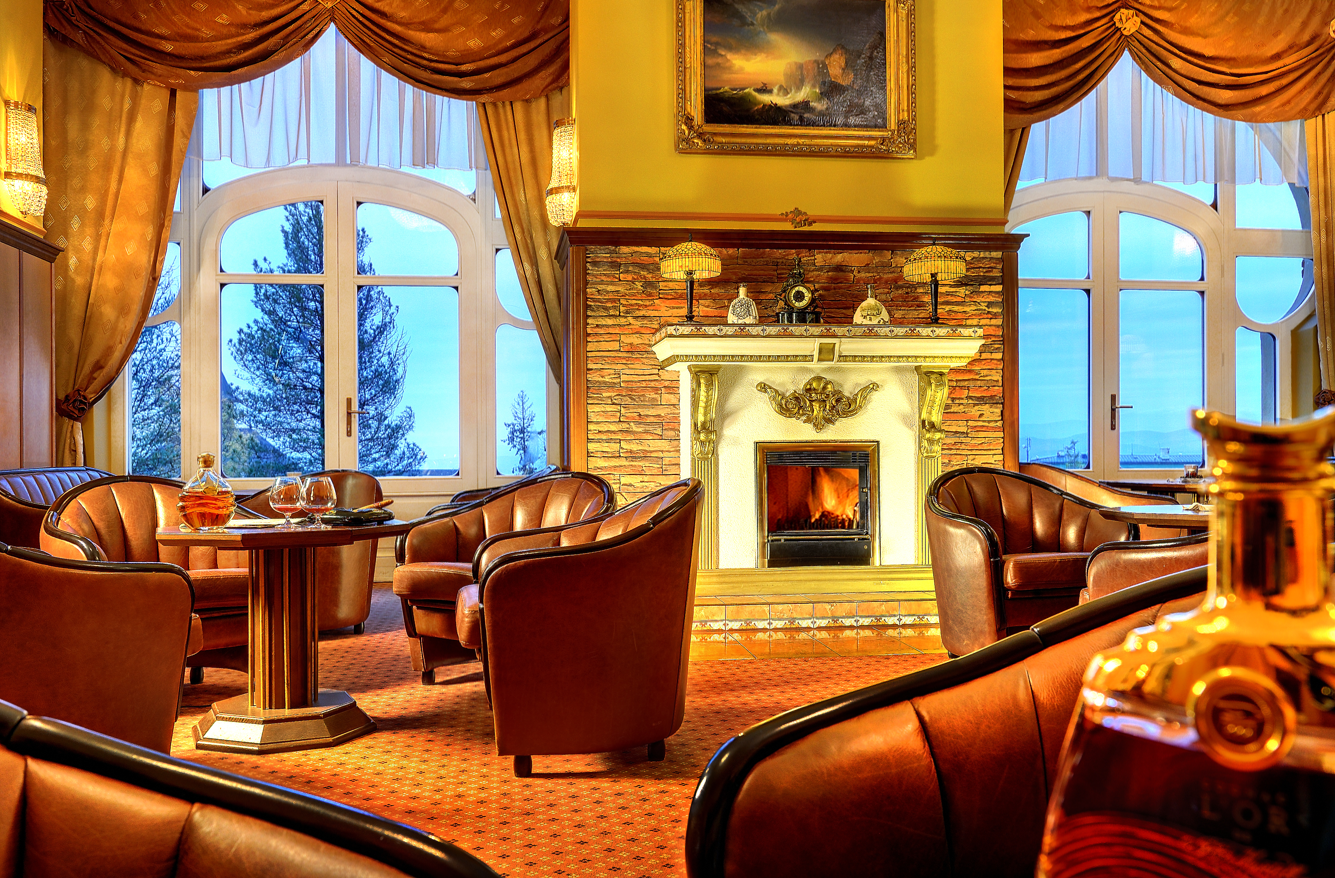 Grandhotel Stary Smokovec lounge, communal seating area, leather armchairs, open fire, grand traditonal decor